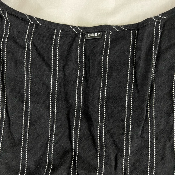 OBEY full sleeve off-the-shoulder top. Black. Size large. Lightly used. - Picture 4 of 6